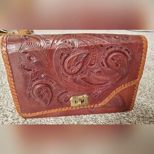 Two tone hand-tooled reversible leather purse